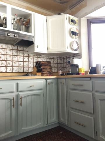Photo of: Kitchen cabinet refinishing: custom painting project for farmhouse style kitchen.