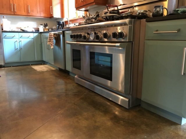 Photo of Kitchen cabinet refinishing: custom painting project.