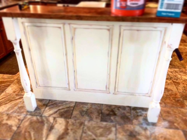 Photo of Kitchen cabinet refinishing: specialty painting finish on kitchen project.