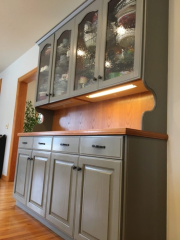 Photo of Kitchen cabinet refinishing: custom painting project.